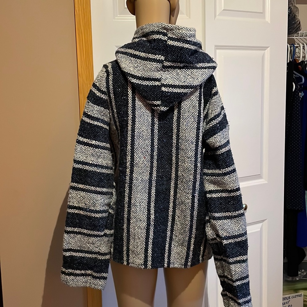 Blue hooded poncho